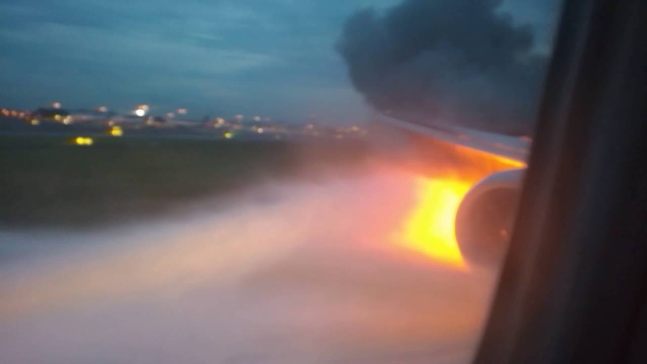 Singapore Airlines SQ368 on fire after emergency landing - VIDEO FROM CABIN