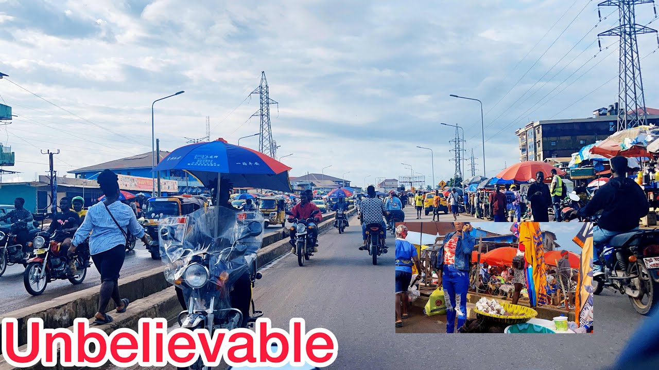 See what Liberians are doing in red light market || driving through Monrovia