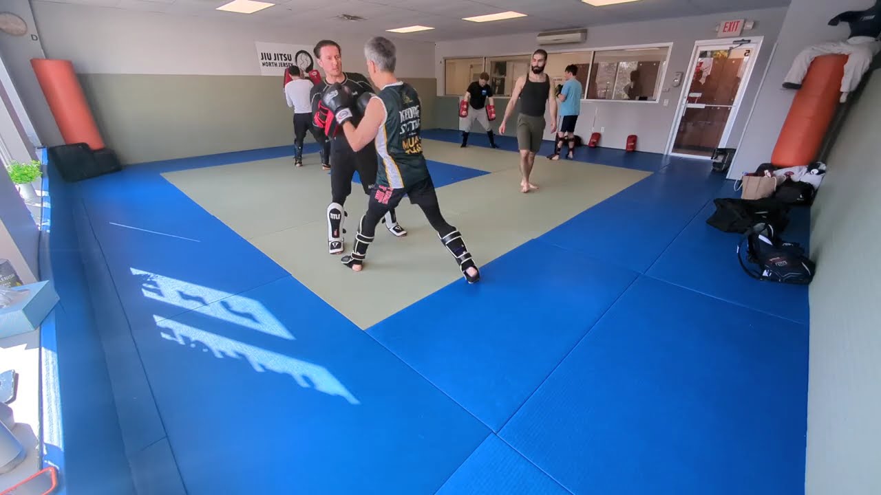 Muay Thai - right kick, jab-cross, right knee, right elbow combo