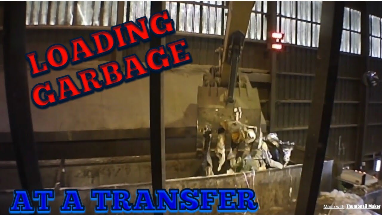 Loading garbage at a transfer station.