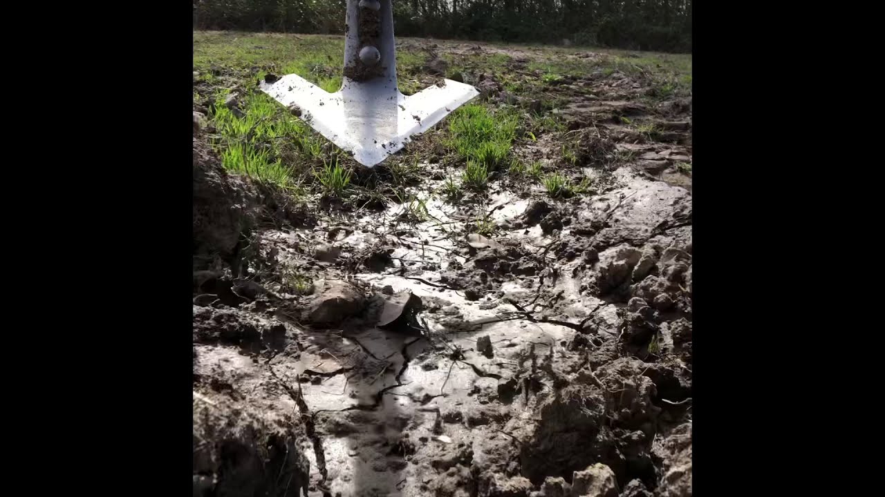 Ripping up hard pan with my subsoiler.