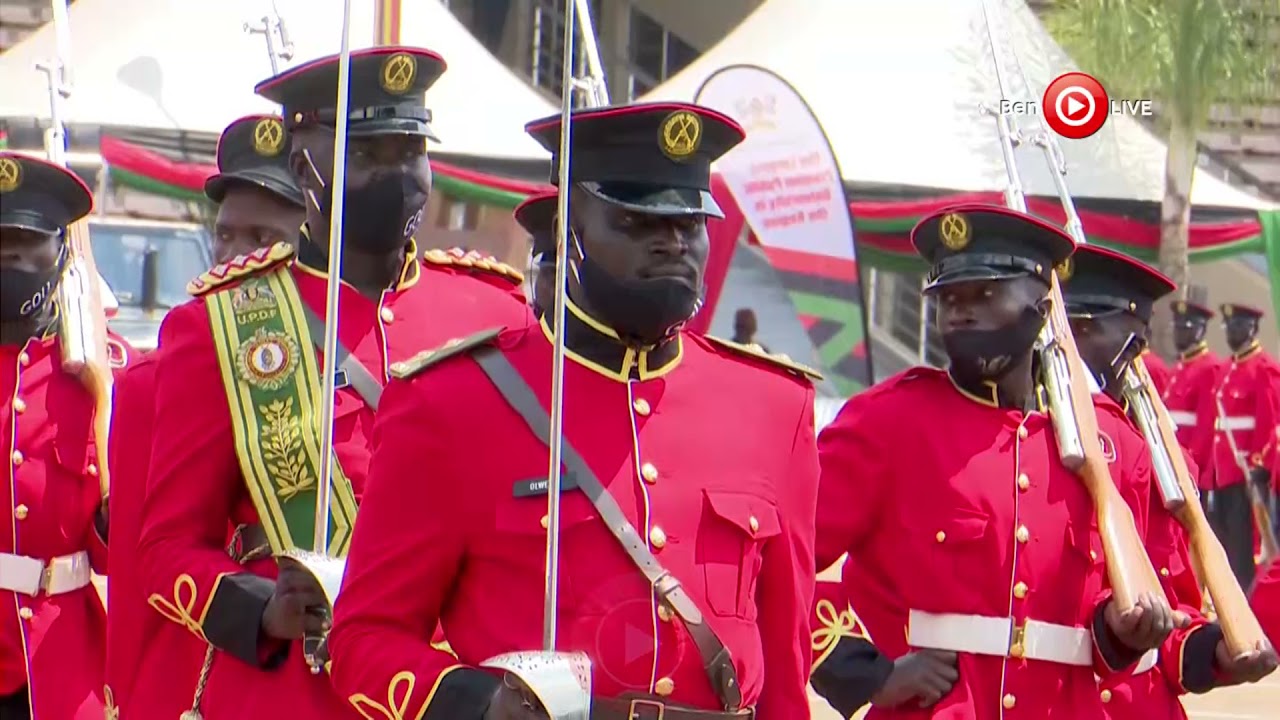 Museveni watches Independence Day Parade honoring the Uganda Flag as Uganda Anthem plays at Kololo