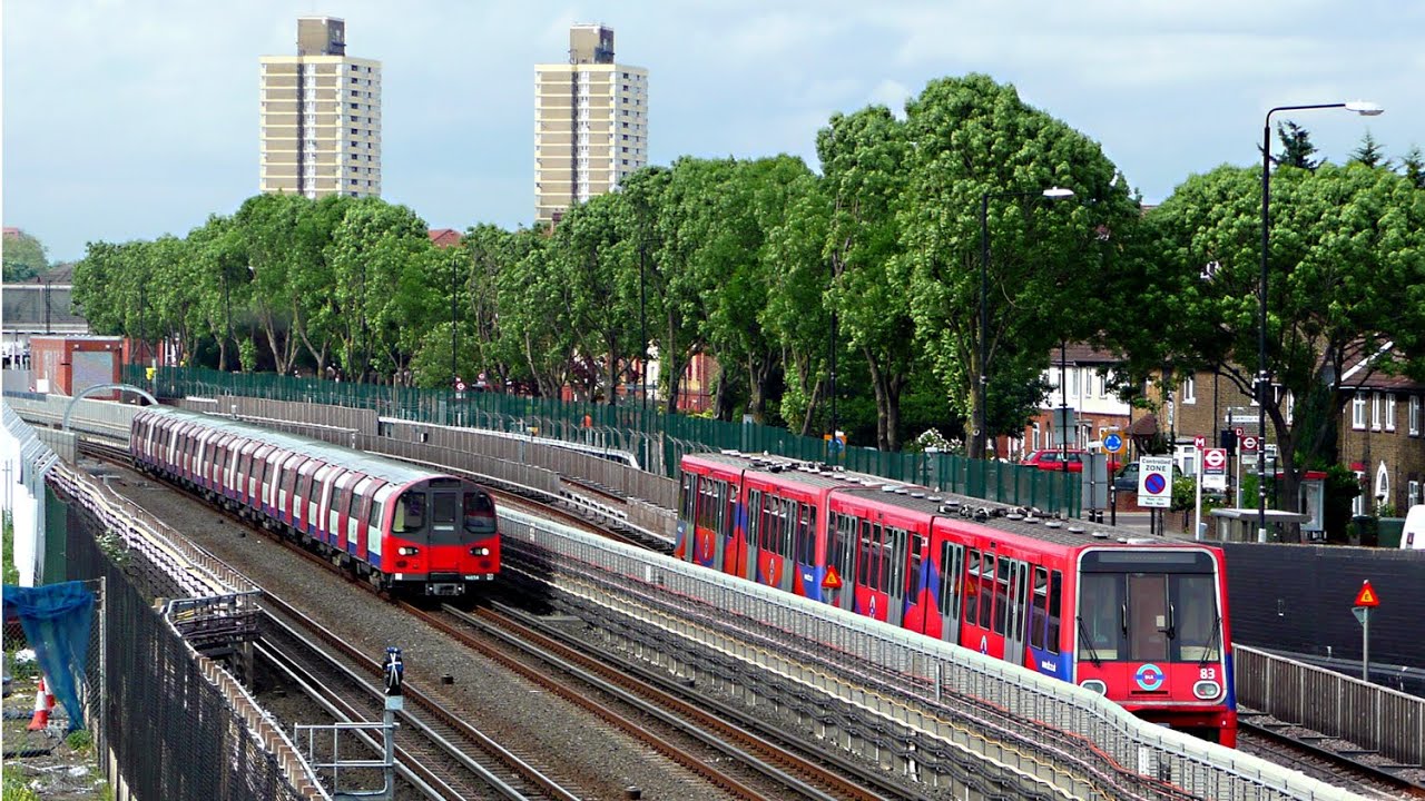 High Speed Tube Train & DLR Side By Side Ride
