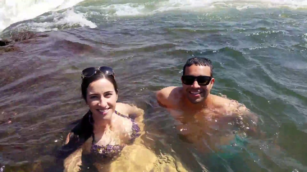 Swimming in the Devil's Pool of Victoria Falls in Livingstone, Zambia