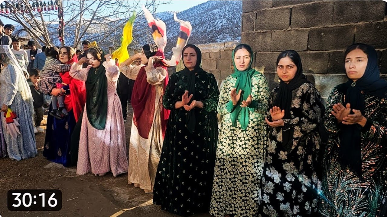 Smiles, Local Dance, and Traditional Clothing at a Nomadic Wedding