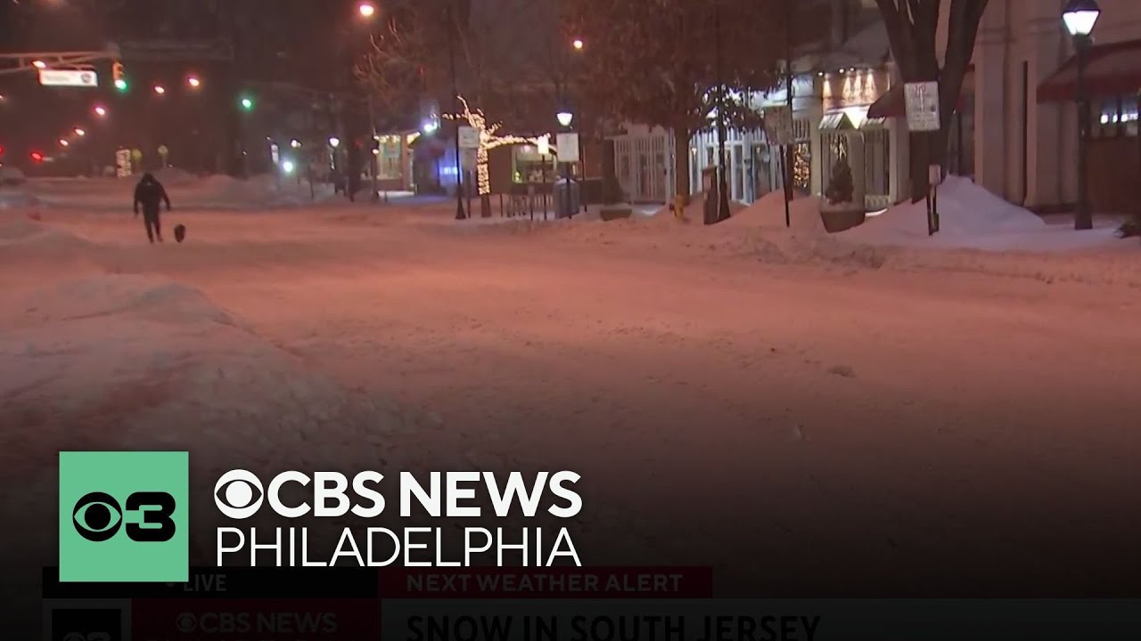 Residents venture out in Haddonfield, New Jersey, as roads remain snowy