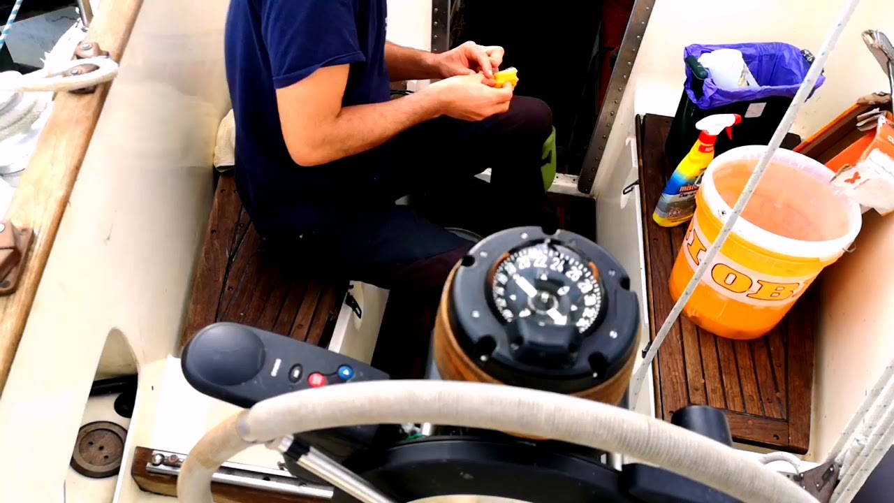 Cleaning the teak deck of my sailboat. 31 foot 1968 Boström.