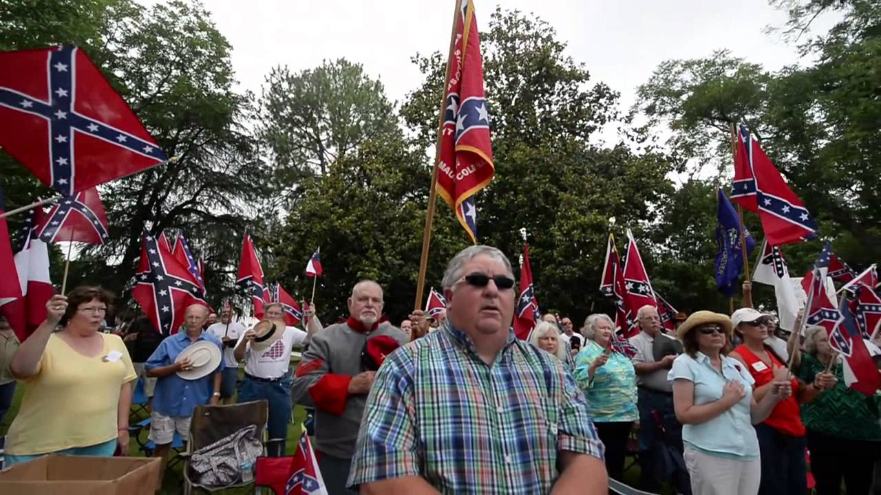 Confederate flag supporters sing I Wish I Was in Dixie