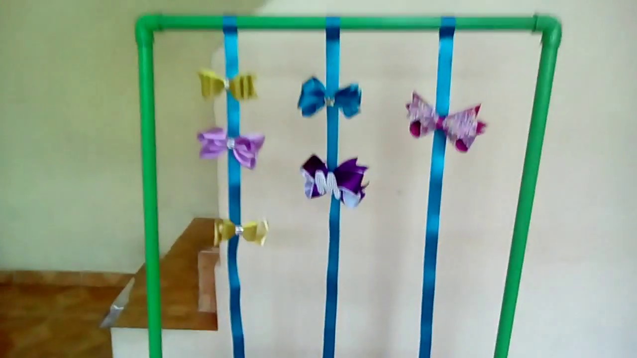 Expositor de tiaras de cano PVC