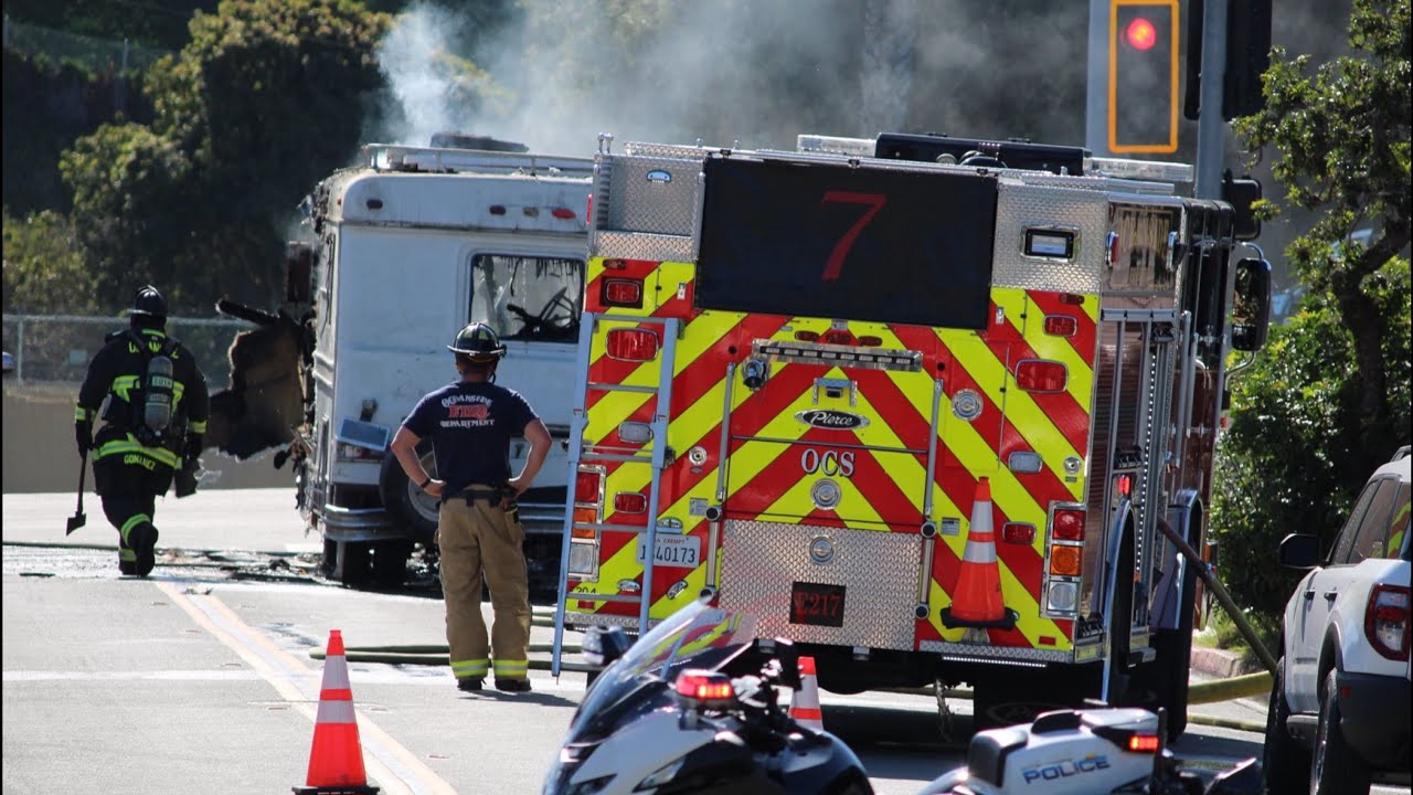 Oceanside fire department tackling a motorhome fire