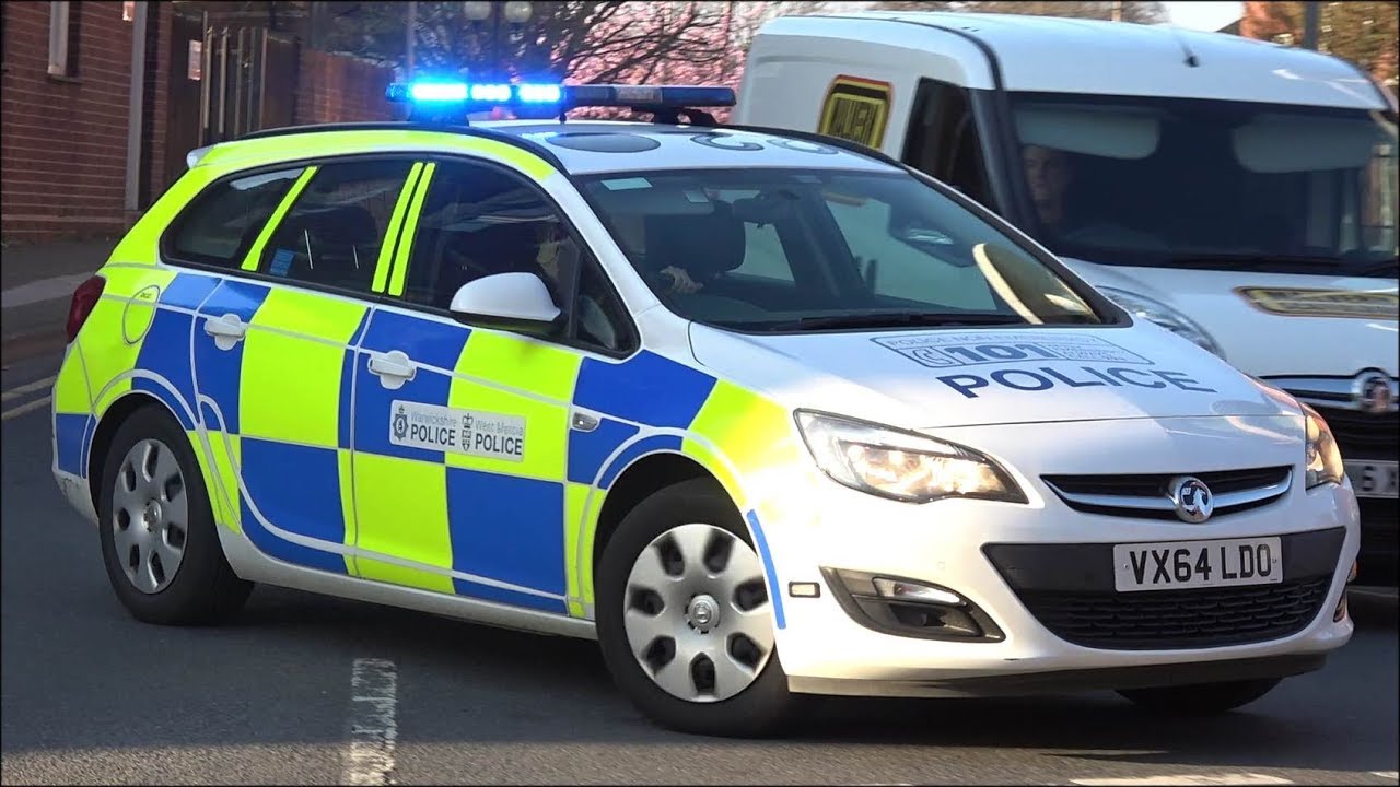Police car responding from and then back into Worcester Police Station