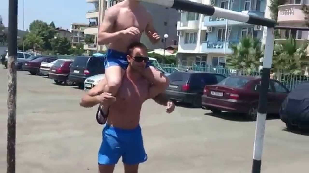 Squat with a man on the shoulders