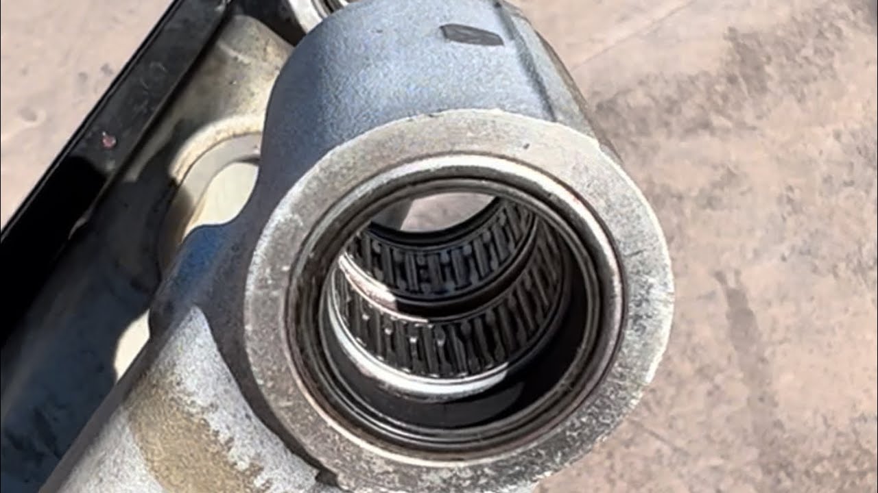 Urgh!   148 rollers to clean and grease in KTM 790 Adventure R swingarm!
