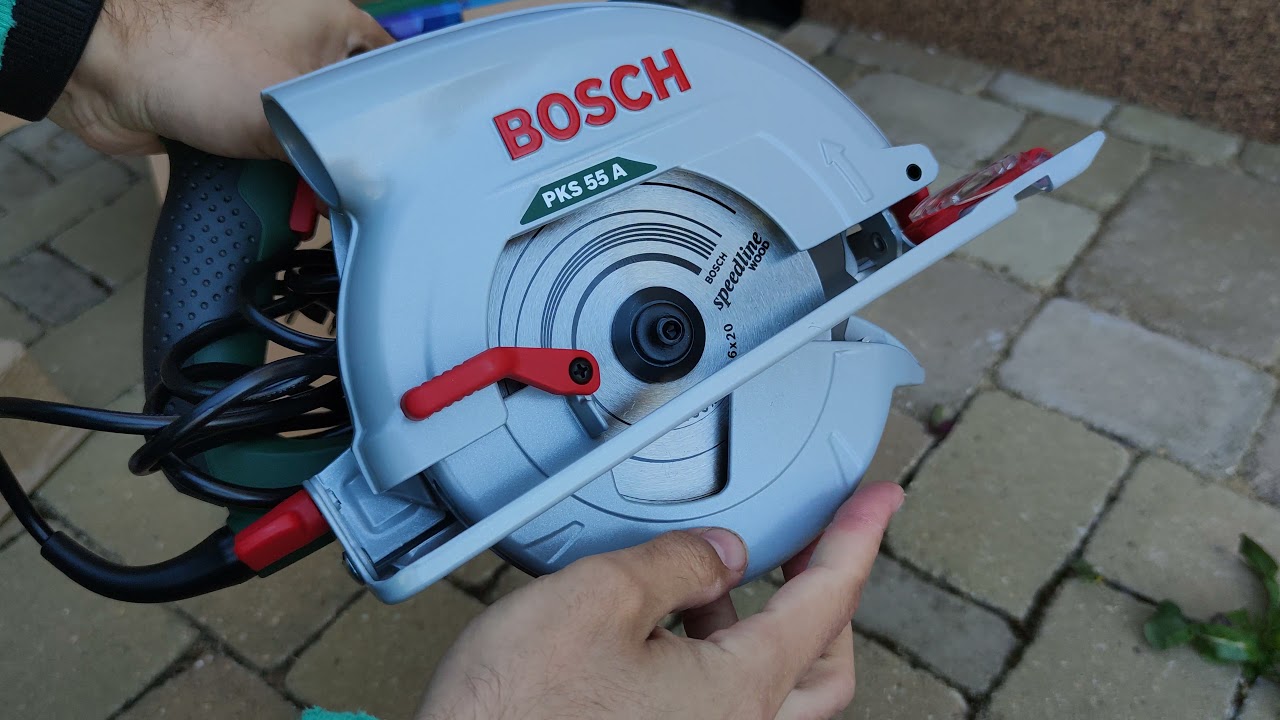 Unpacking / unboxing hand-held circular saw Bosch PKS 55 0603501002