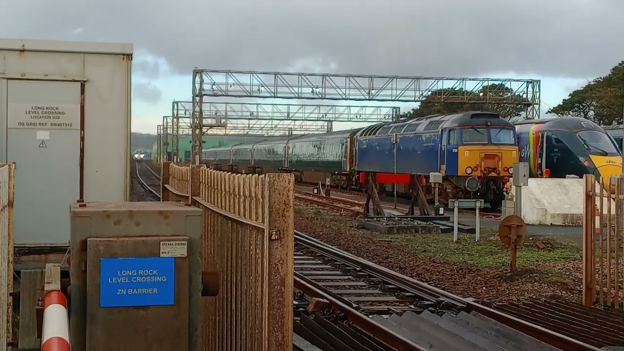GWR 800024 train passes through Longrock Cornwall and 57301 parked up. 25 Jan 2026 09:46 