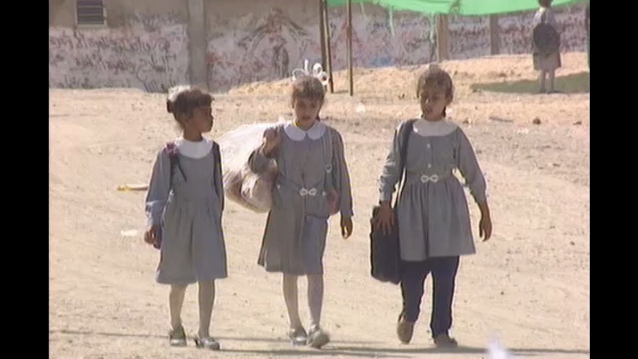 1994 Gaza: refugee camp, children, streets, daily life, urban, graffiti  on june 6th