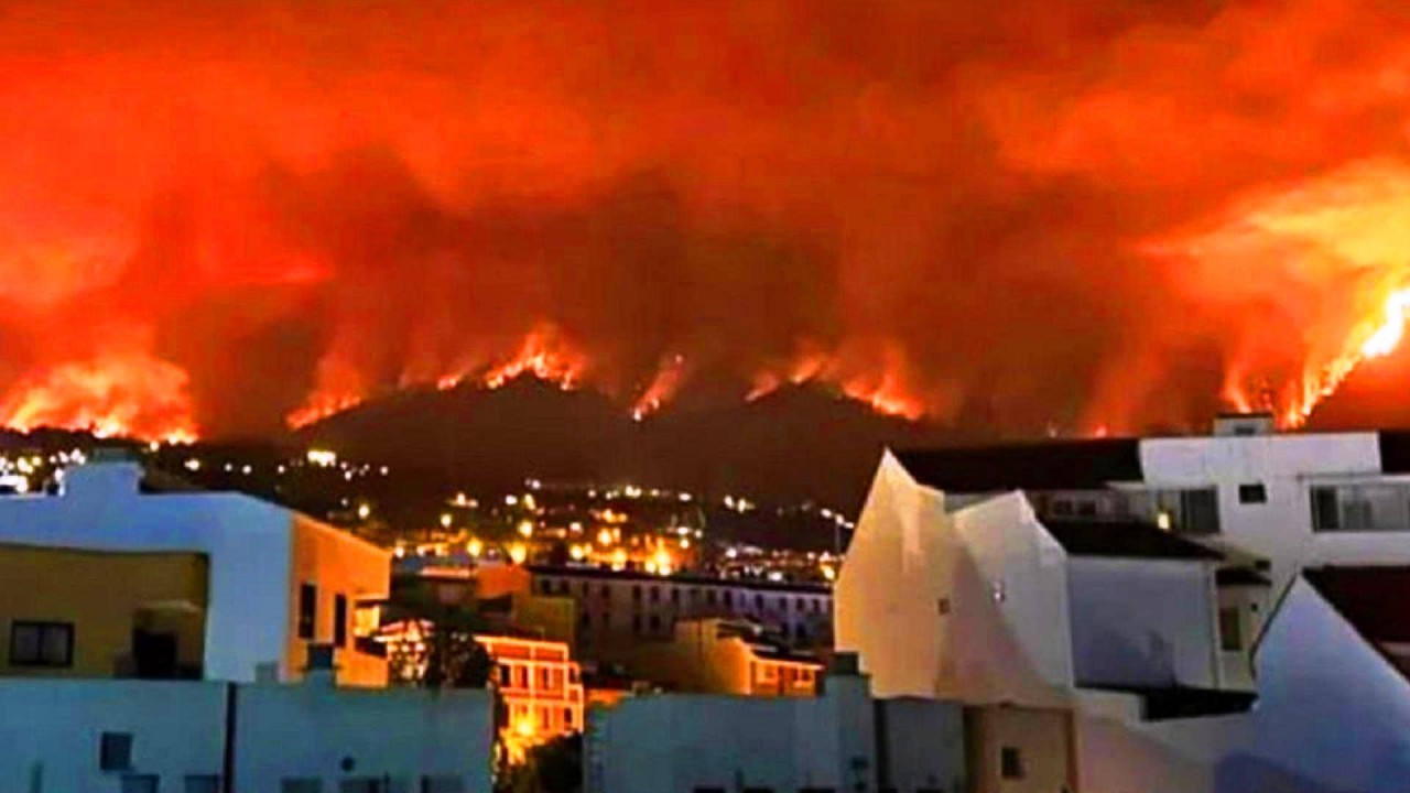 Spain engulfed in fires as storms batter the rest of Europe