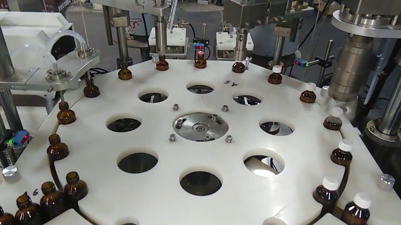 Automatic eliquid filling stoppering, screw capping machine for ejuice, essential oil