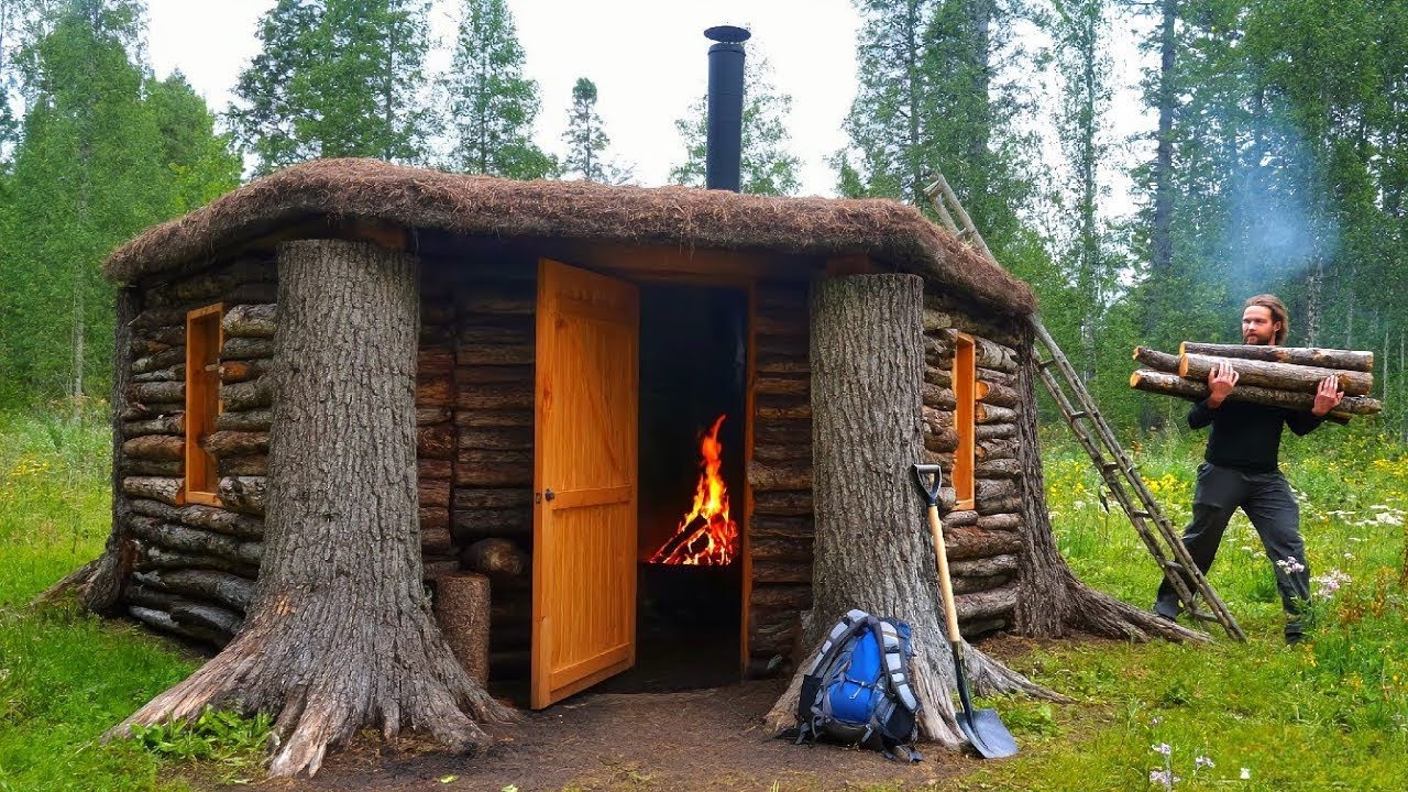 A lone man builds a shelter between two trees#survival #bushcraft #shelter