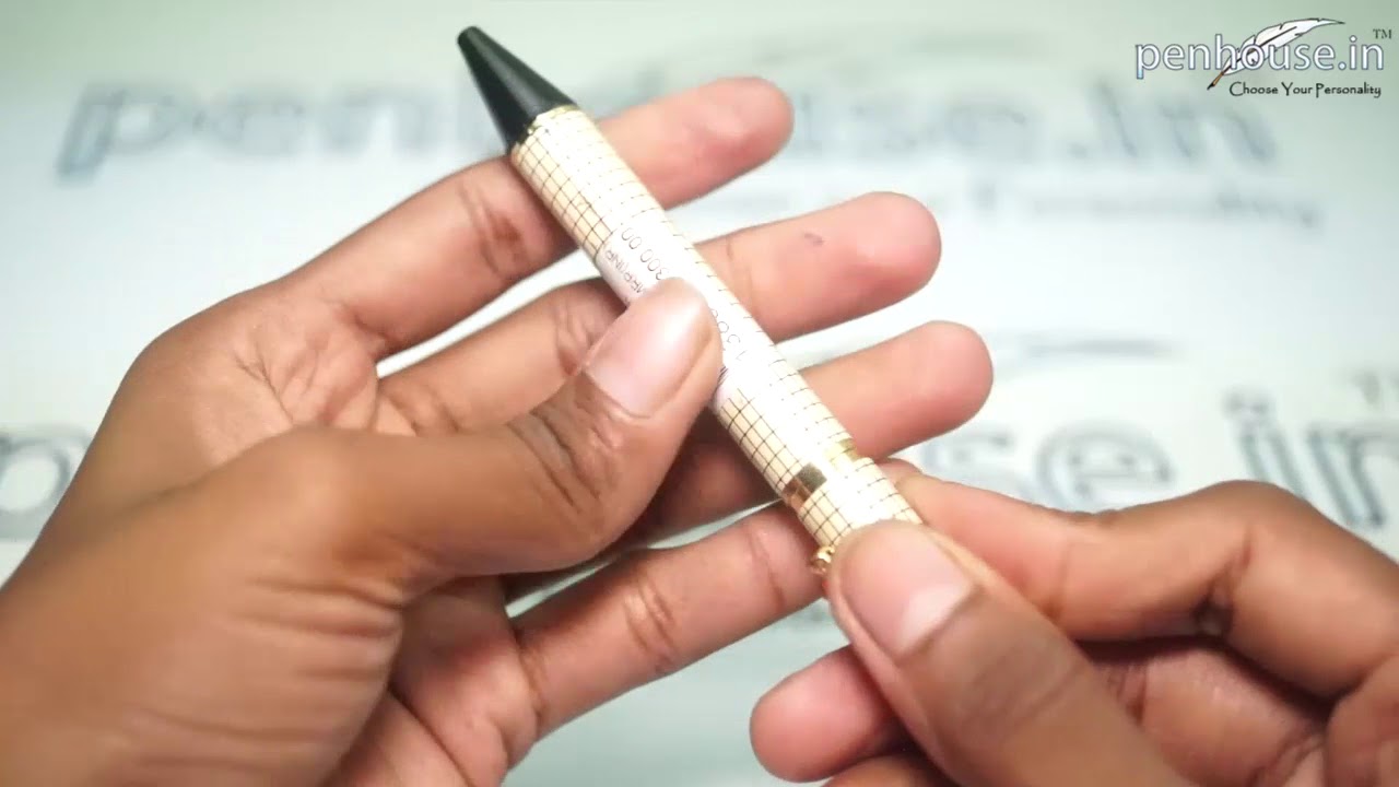 penhouse.in Model: 13809 Yellow color checked design with dragon clip with medium tip ball pen