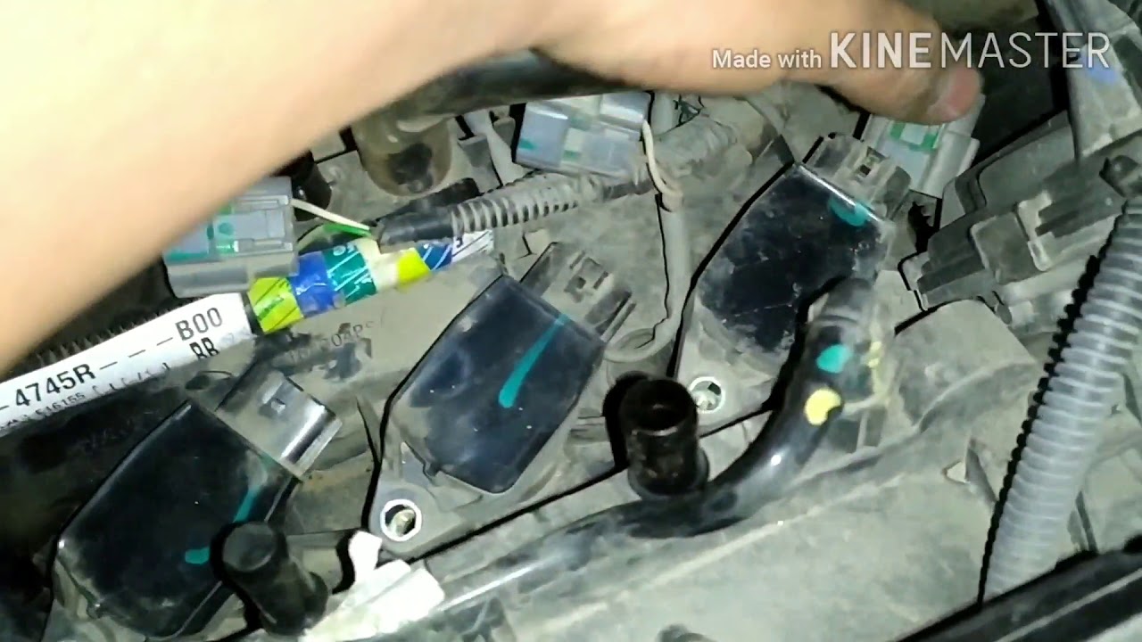 Renault Kwid Ignition coil and spark plug location and function