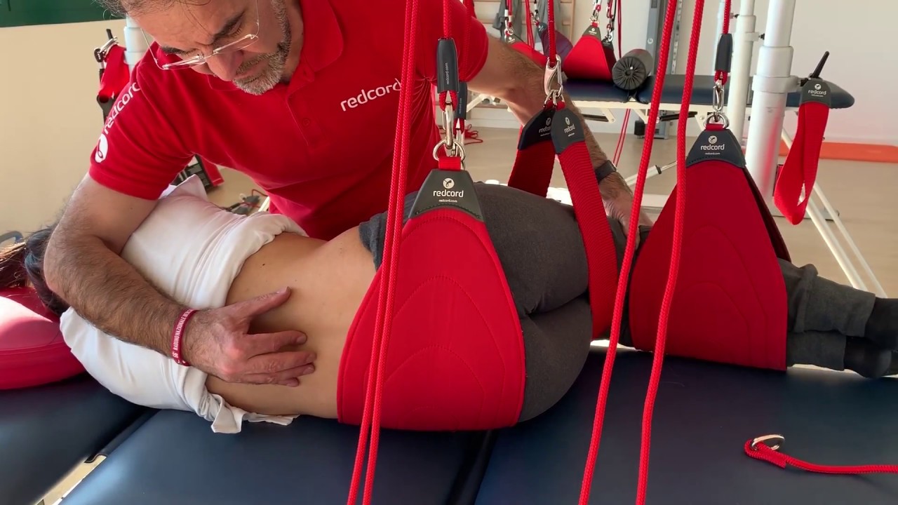 Terapia manuale con il sistema a sospensione Redcord
