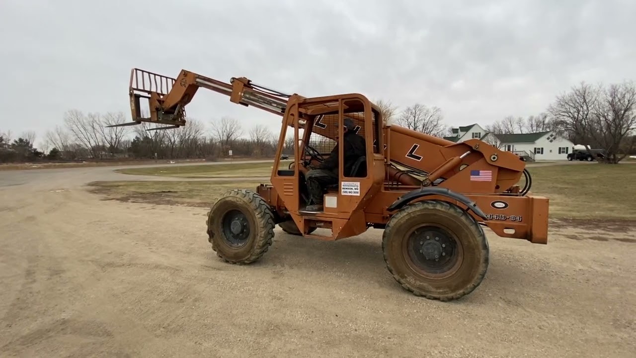 (I-1818) LULL 644D-34 TELEHANDLER 4WD, 5,414 HRS, 34' EXTEND, 6,000 LBS LIFT, FORKS, FOAM-FILLED TIR