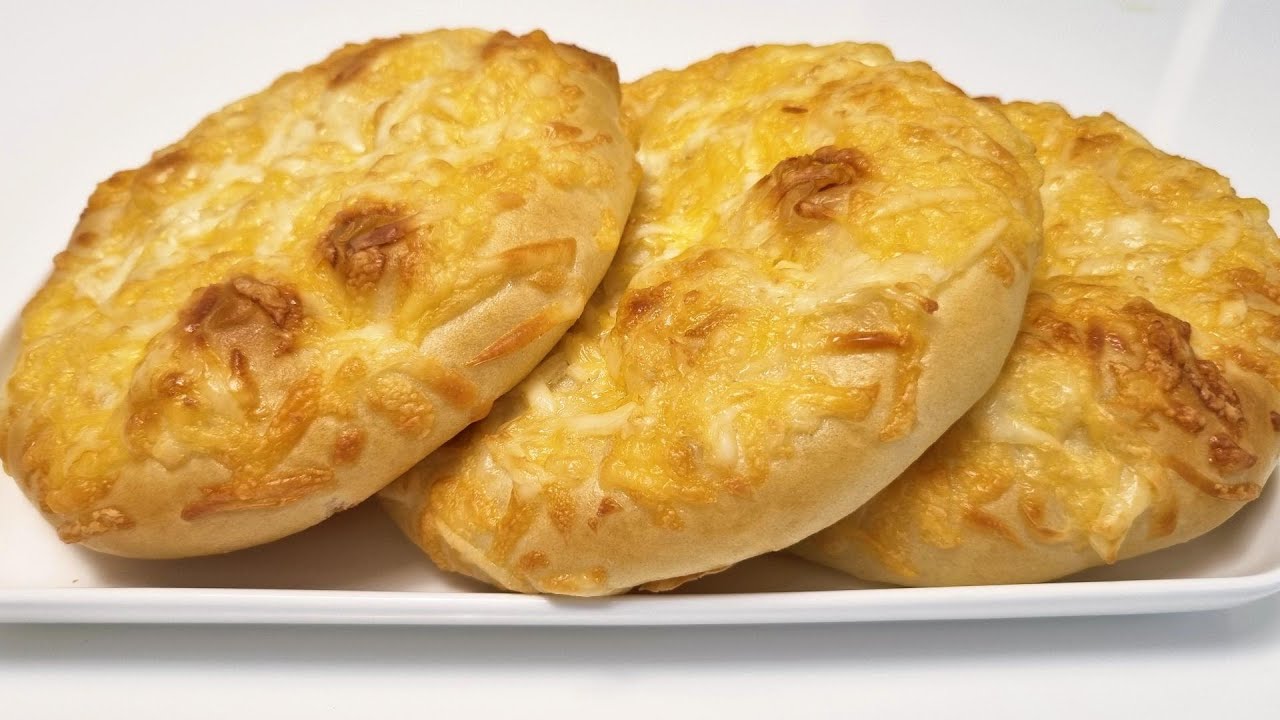Сырные лепешки/Сирні палянички.