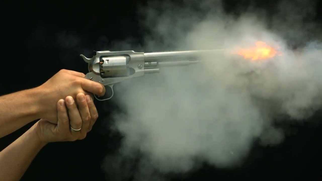 Gun Firing in Slow Motion HD a Revolver Shot in Slow Mo Views of Trigger Hammer Chamber and Barrel