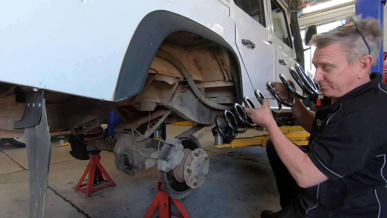 Land Rover Defender OME long-travel suspension installation