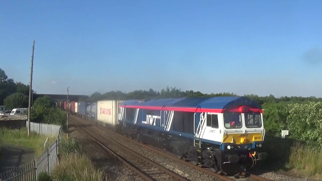 *New Liveried* 66747 passes foxcovert road footbridge 15/07/19