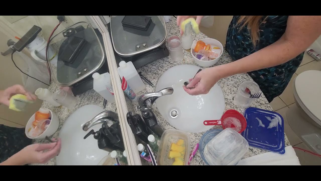 08.08.23 Cleaning: Boring mom stuff.  Doing dishes in the bathroom at the hotel while on a crazy cat