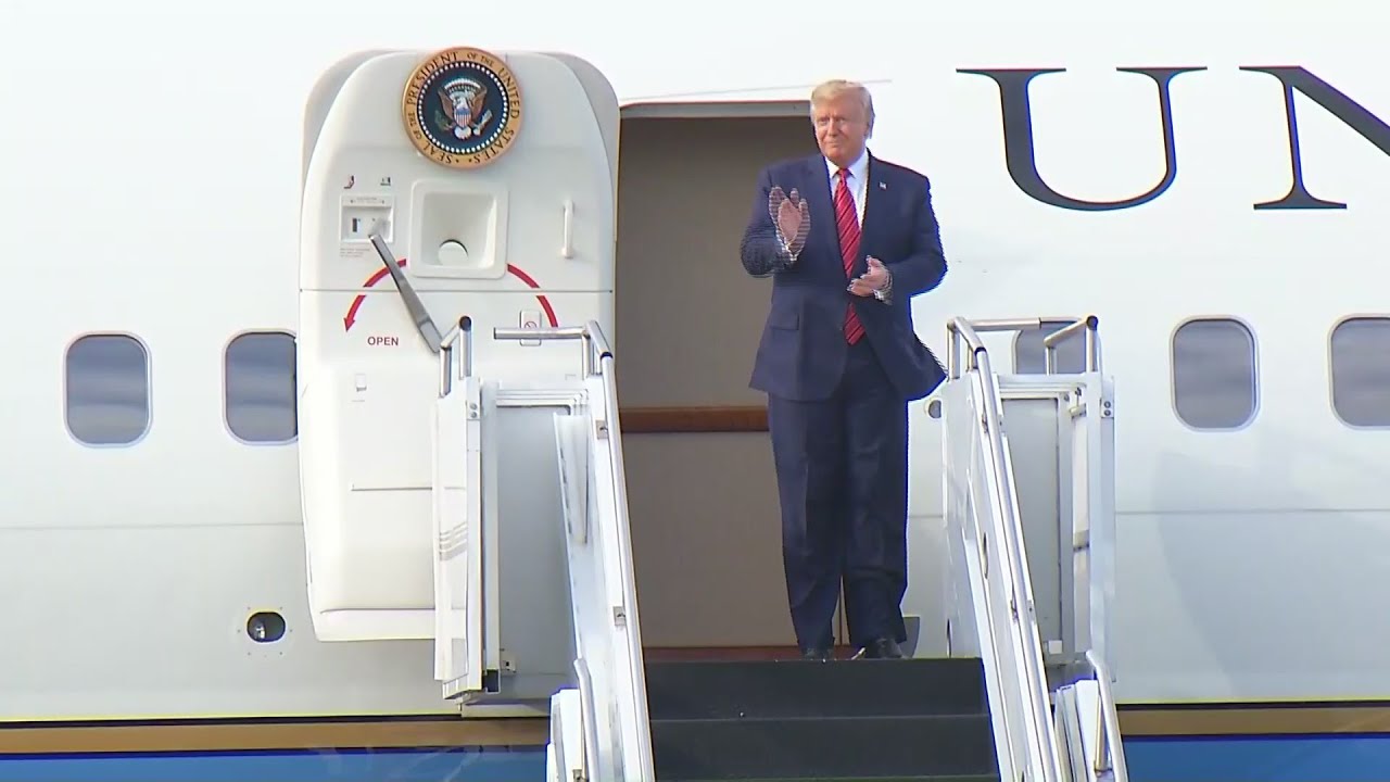 Air Force 1 arrives for President Trump's tour of Wapakoneta paper plant