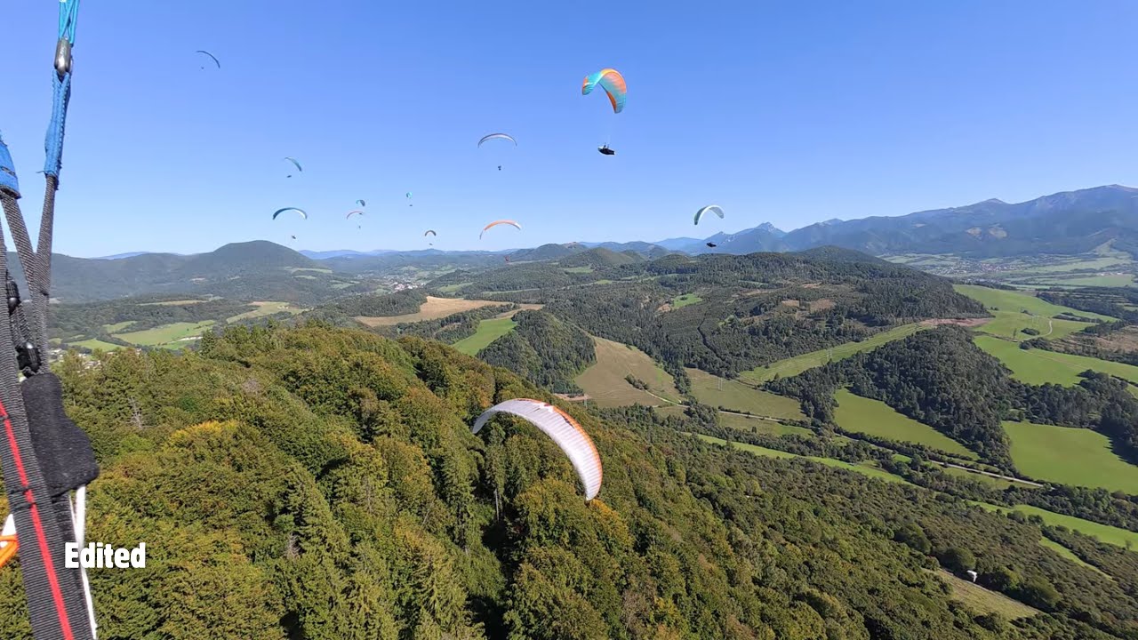 Paragliding - Many paragliders in the air (Straník, SK)