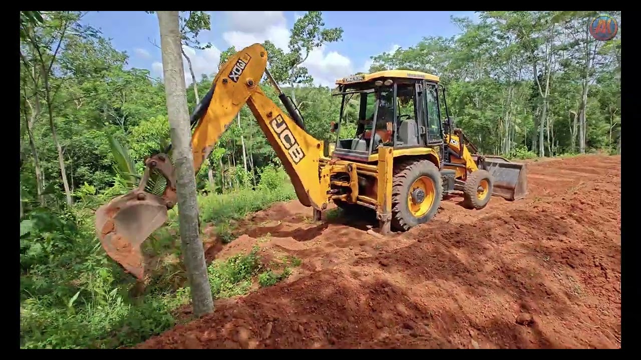Terracing land for Rubber Tree Planting using JCB 3dx