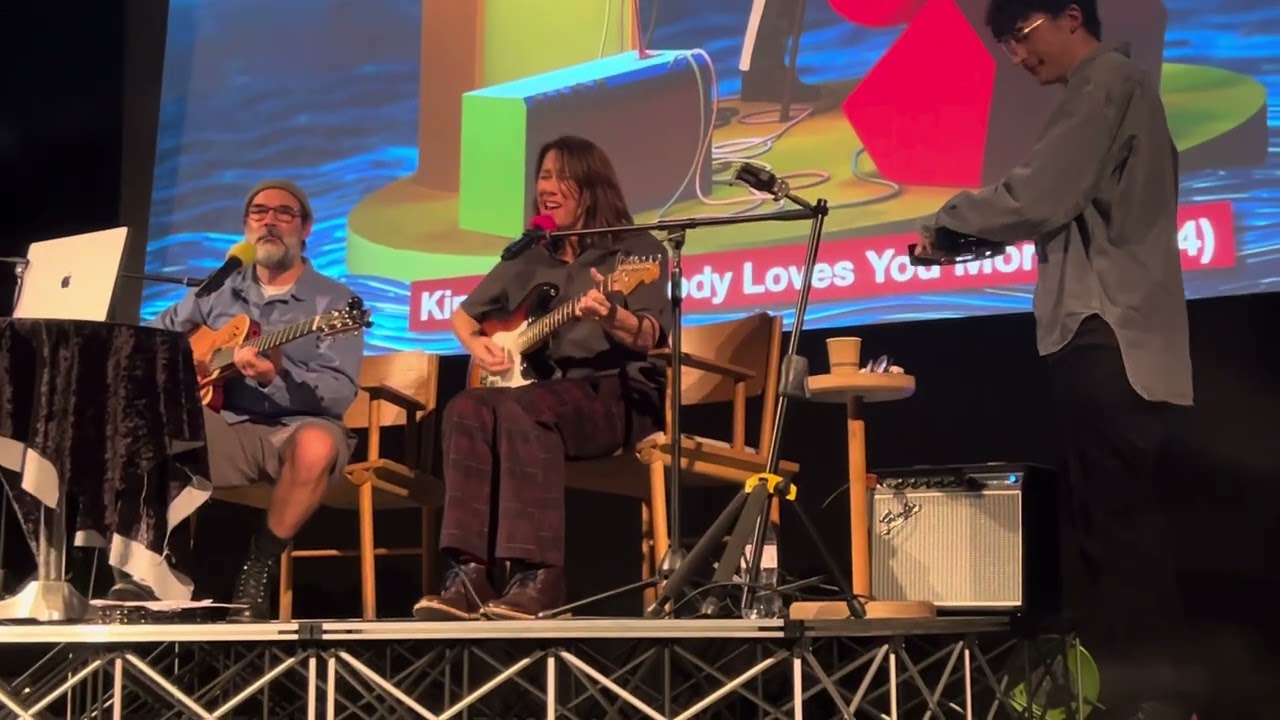 Kim Deal and Adam Buxton performing “Are You Mine?” at the Rio Cinema, London