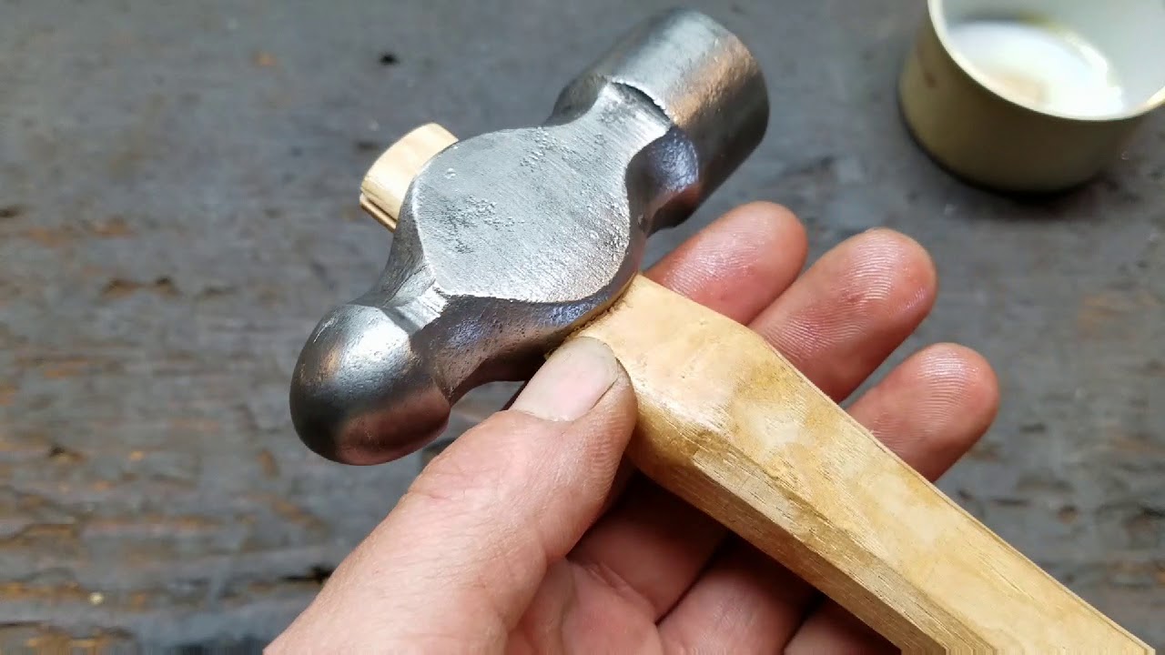 Old hammer....New handle. Plumb 12 ounce ball peen