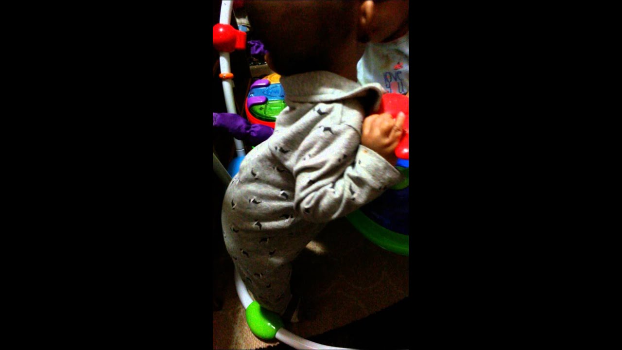 My son Maajid is 6 months standing and holding on