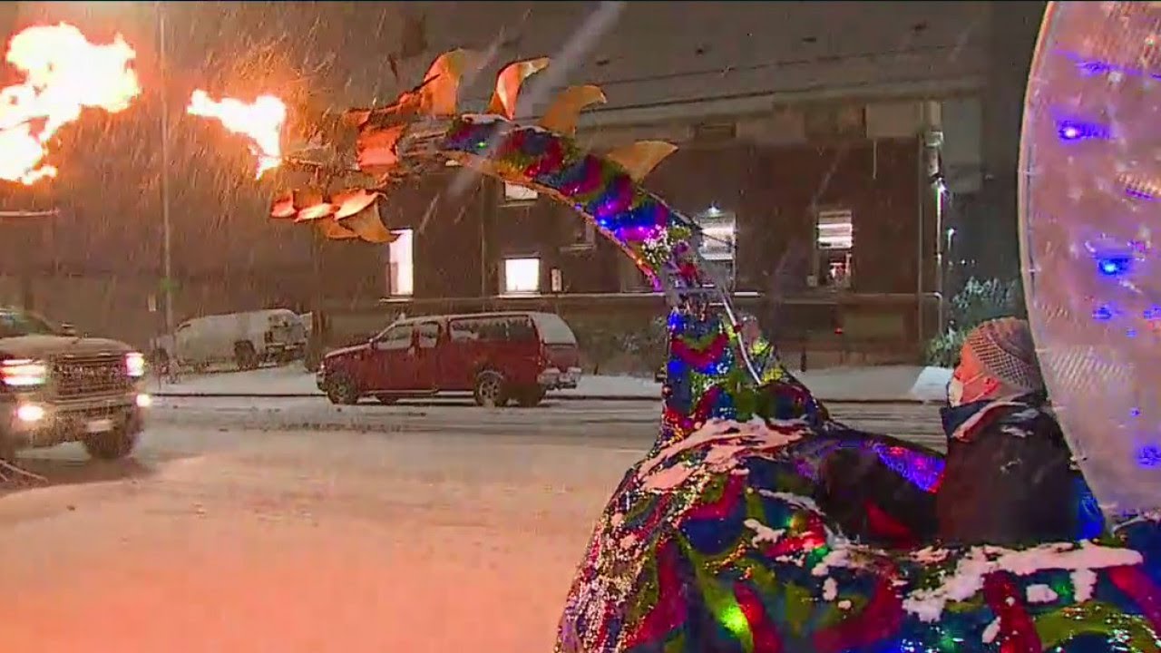 Couple takes fire-breathing dragon tricycle for spin in Tacoma during snowstorm