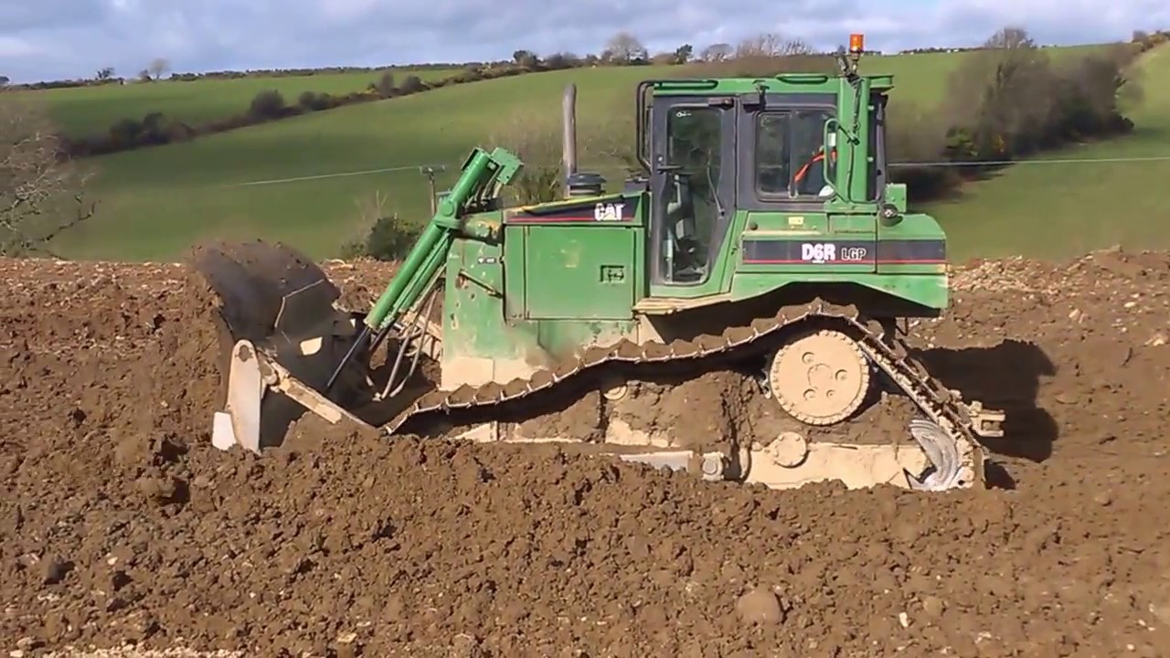CAT D6 LGP dozer at work pushing soil / muck shifting