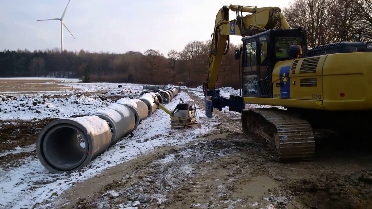 Depenbrock Kettenbagger CAT 324 D mit Rohrzonenverdichter und Rohrgreifer