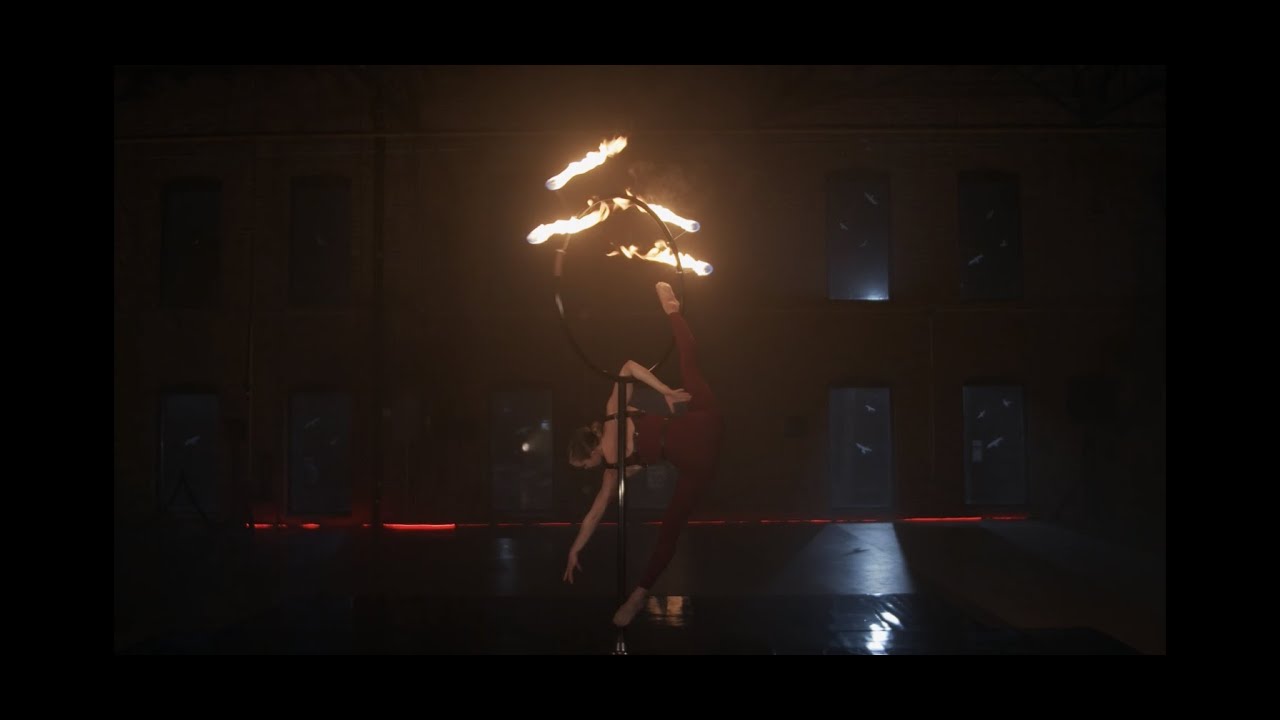 Laura Lawless Circus - Little Red Riding Hood - A unique fire lollipop lyra aerial circus act