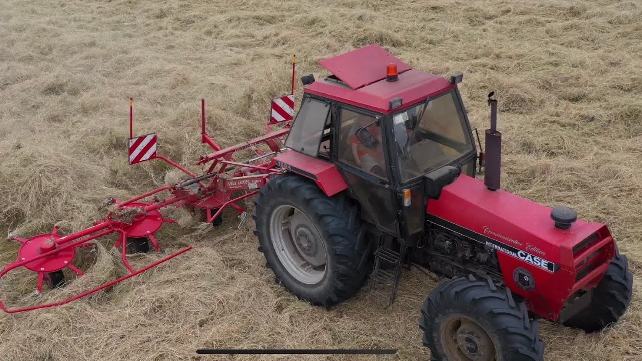 Case 1594 Commemorative turning Hay with a Lely Lotus 770