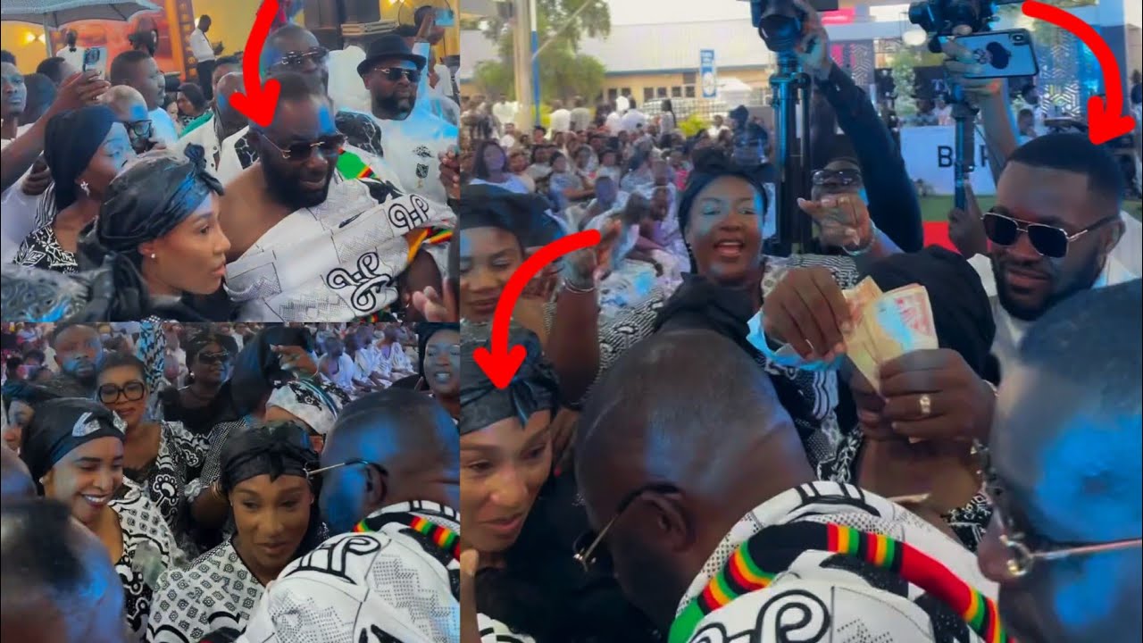Dr. Osei Kwame Despite and wife on the dance floor as Kennedy spray Cash on them