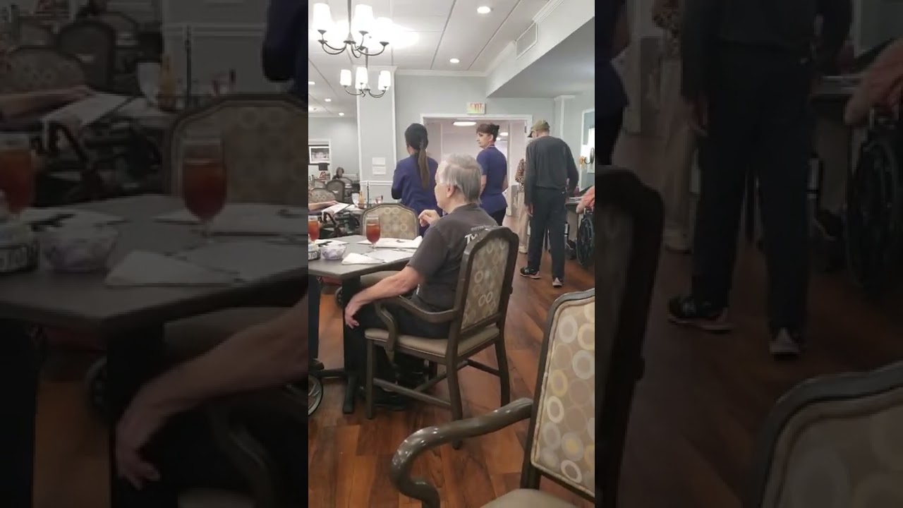 Senior Living Two Men Fighting Over Chair