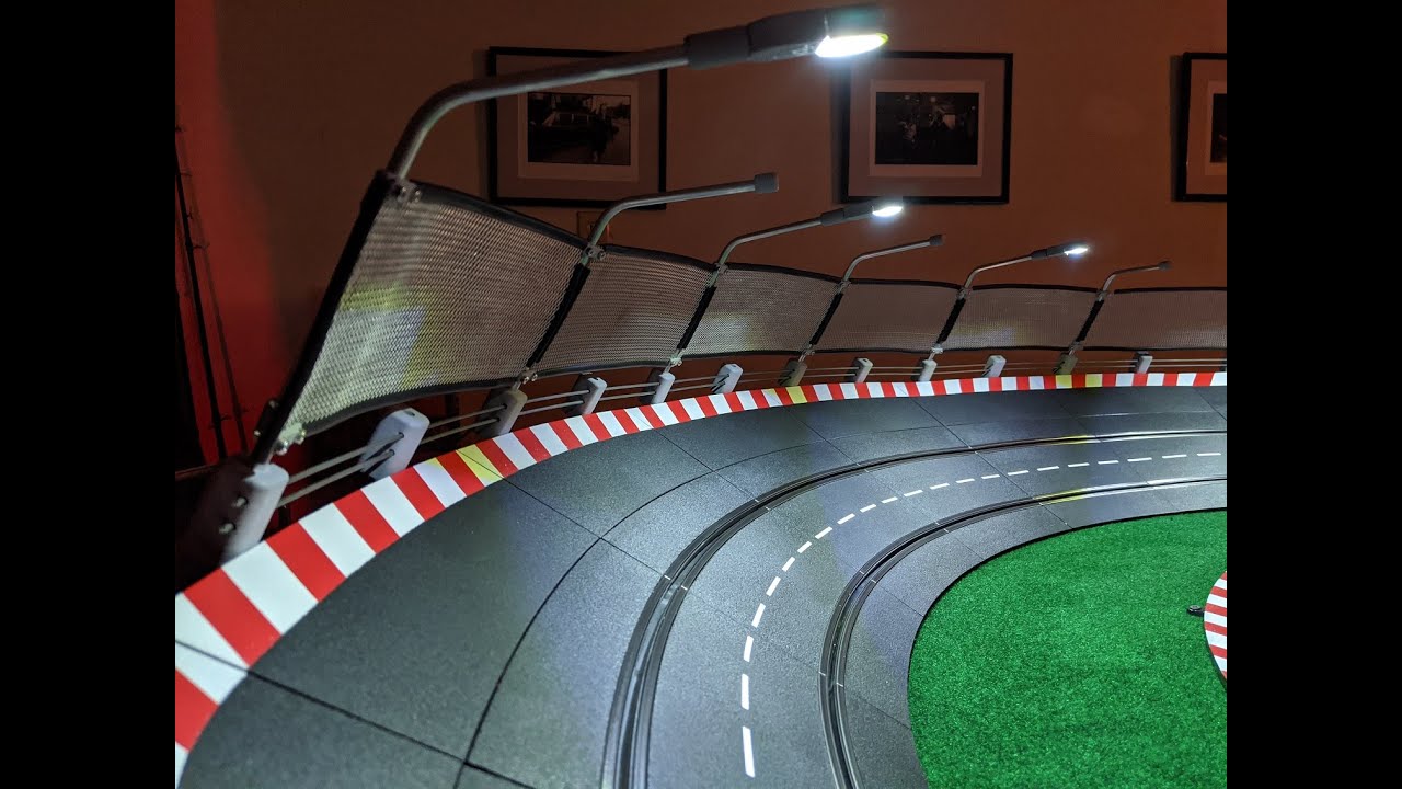 New Track Lighting, Guard Rail, and Catch Fence for Carrera Slot Car Track