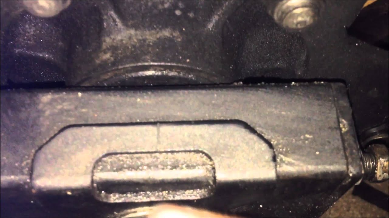 how to: tighten a chain on a motorcycle (ninja 250)