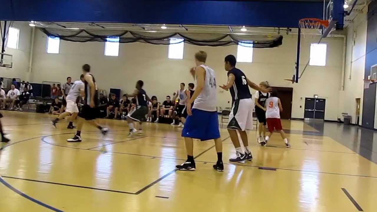 ROBERT MARA DOWNERS GROVE SOUTH HITTING 18 FT JUMP SHOT OVER 7 FT CENTER
