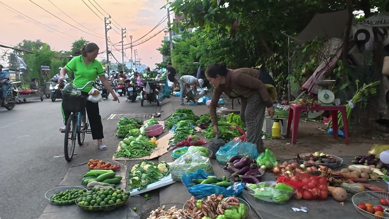 The Old Woman Is Sitting And Selling Vegetables At The Lonely Market, But No One Is Buying