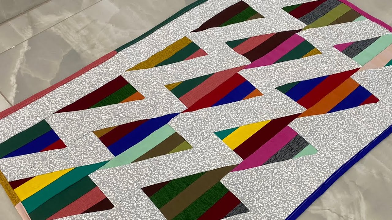 Tapete em patchwork super colorido para reaproveitar faixas pequenas